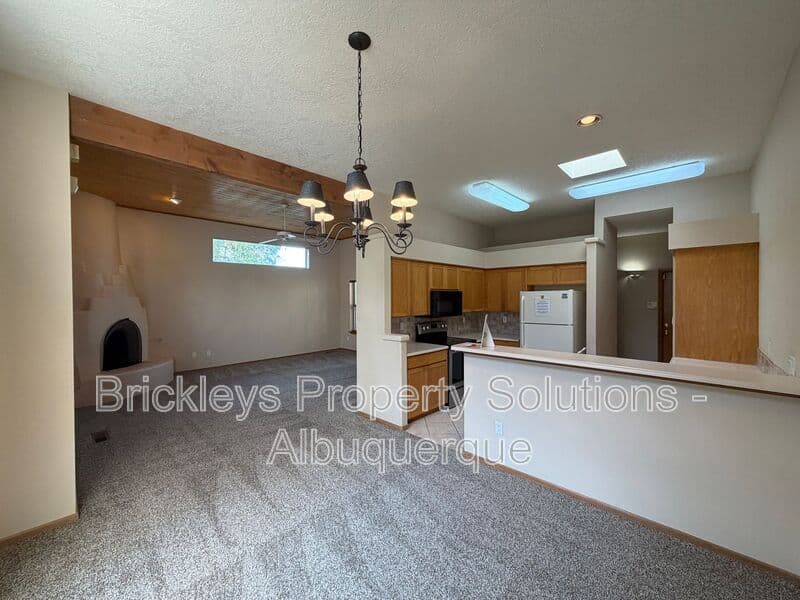 3-bedroom 2-bath home at 12606 Colony Pl NE for $2,250/mo managed by Brickleys Property Solutions Albuquerque — photo 8 of 32