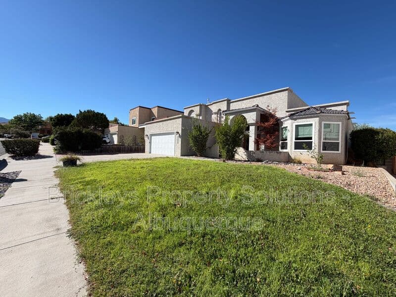 3-bedroom 2.5-bath home at 9600 Allande Rd NE for $3,200/mo managed by Brickleys Property Solutions Albuquerque — photo 2 of 40
