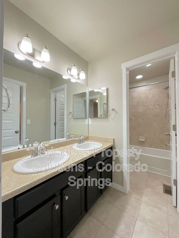 3-bedroom 2.5-bath home at 2401 Ellingwood Dr for $2,233/mo total (includes $2,195 base rent + $38 required Tenant Benefit Package) managed by Brickleys Property Solutions Colorado Springs — photo 36 of 40