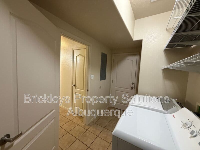 4-bedroom 3.5-bath home at 6228 Nacional Rd NW for $2,700/mo managed by Brickleys Property Solutions Albuquerque — photo 39 of 44