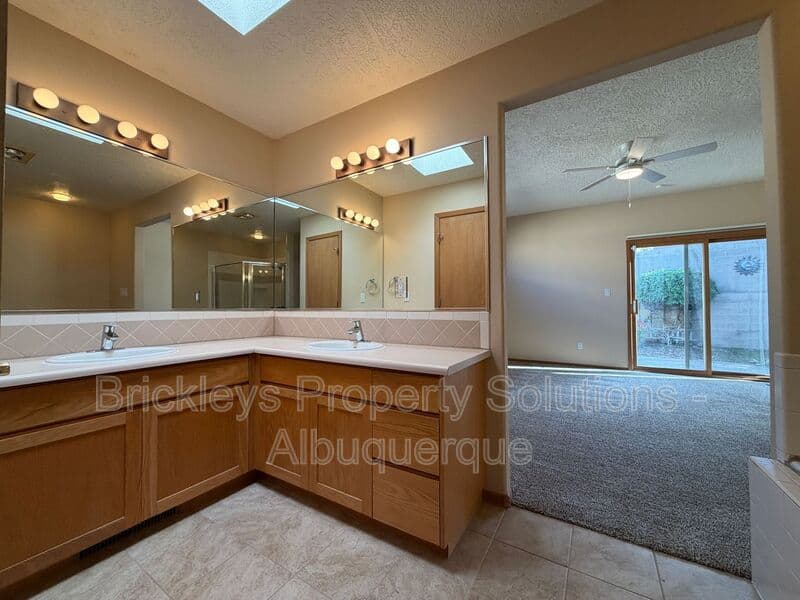 3-bedroom 2-bath home at 12606 Colony Pl NE for $2,250/mo managed by Brickleys Property Solutions Albuquerque — photo 18 of 32