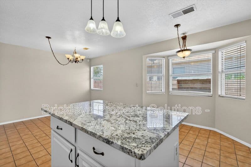 4-bedroom 2-bath home at 2413 Agua Fria Dr NE for $2,275/mo managed by Brickleys Property Solutions Albuquerque — photo 28 of 42