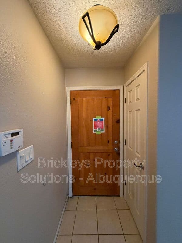4-bedroom 3-bath home at 1904 Busher St. SE for $2,450/mo managed by Brickleys Property Solutions Albuquerque — photo 4 of 50