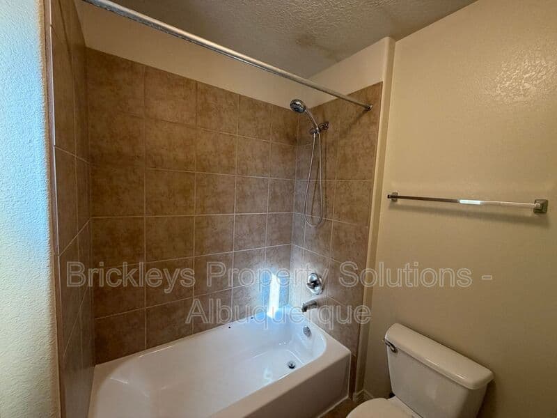 4-bedroom 3.5-bath home at 6228 Nacional Rd NW for $2,700/mo managed by Brickleys Property Solutions Albuquerque — photo 18 of 44