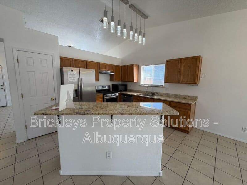 3-bedroom 2-bath home at 1405 Secret Valley Drive SW for $1,800/mo managed by Brickleys Property Solutions Albuquerque — photo 7 of 34
