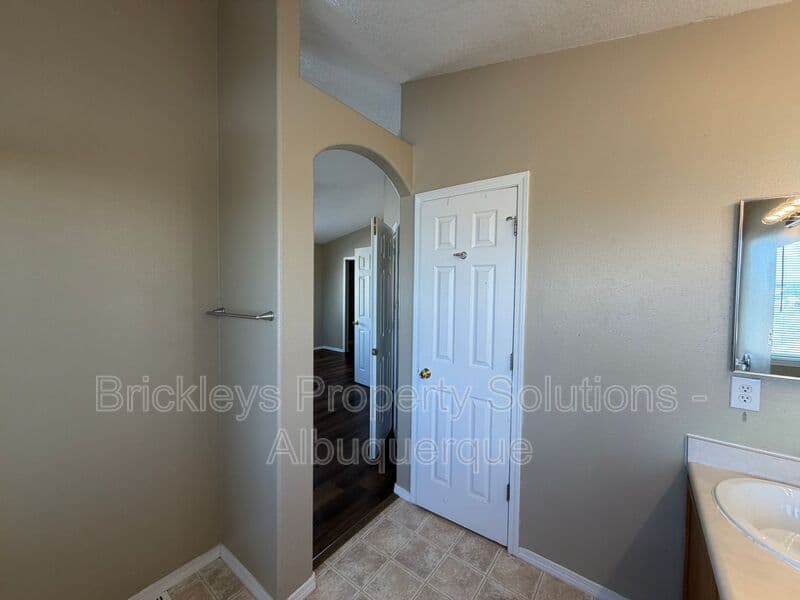 3-bedroom 2.5-bath home at 10527 Brookline Pl NW for $2,300/mo managed by Brickleys Property Solutions Albuquerque — photo 16 of 40