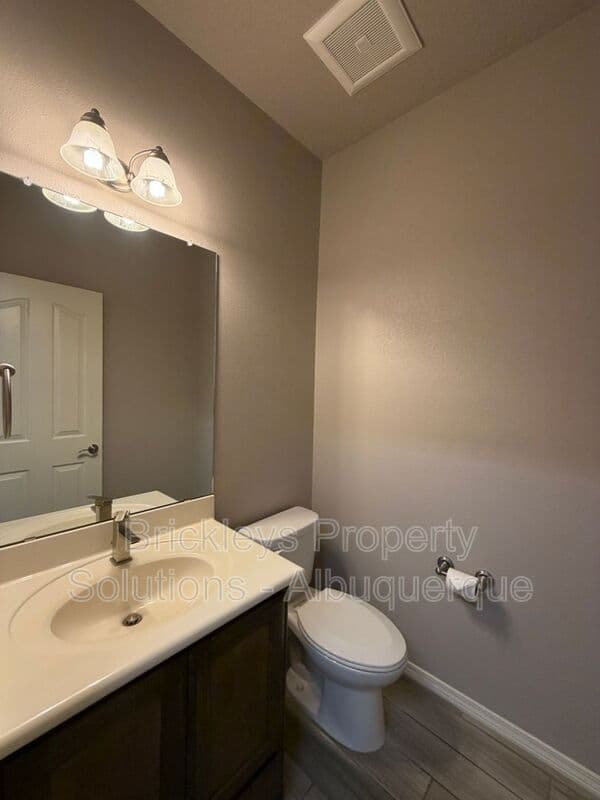 4-bedroom 2.5-bath home at 7420 Tangerine Court NE for $2,450/mo managed by Brickleys Property Solutions Albuquerque — photo 34 of 39