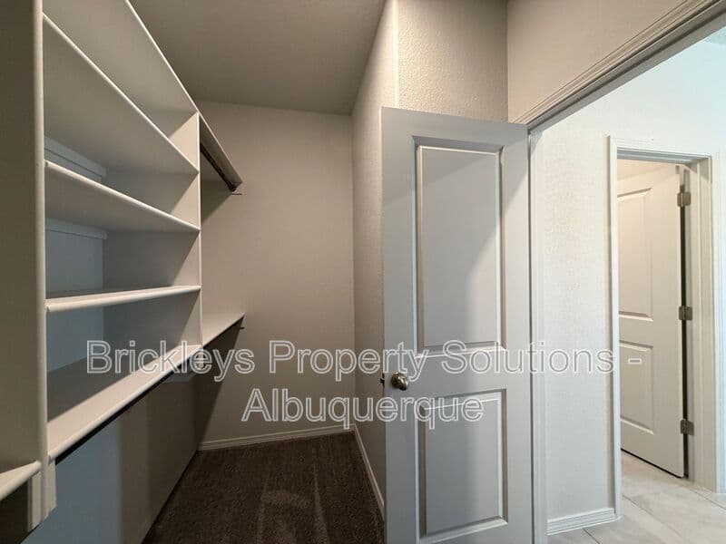 3-bedroom 3-bath home at 6118 Chicago Dr SE for $2,350/mo managed by Brickleys Property Solutions Albuquerque — photo 30 of 42
