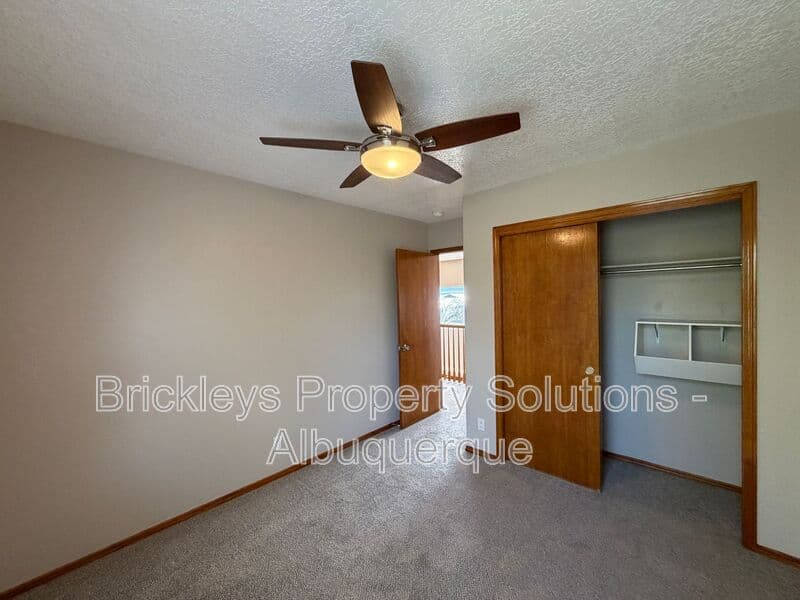 4-bedroom 2.5-bath home at 10331 Dunbar St NW for $2,300/mo managed by Brickleys Property Solutions Albuquerque — photo 11 of 43