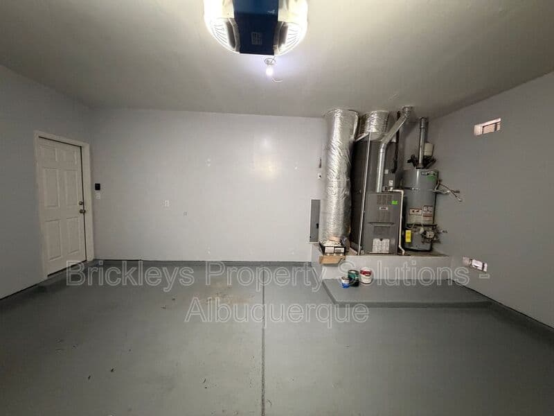 5-bedroom 4.5-bath home at 7008 Tree Line Ave NW for $2,500/mo managed by Brickleys Property Solutions Albuquerque — photo 39 of 43