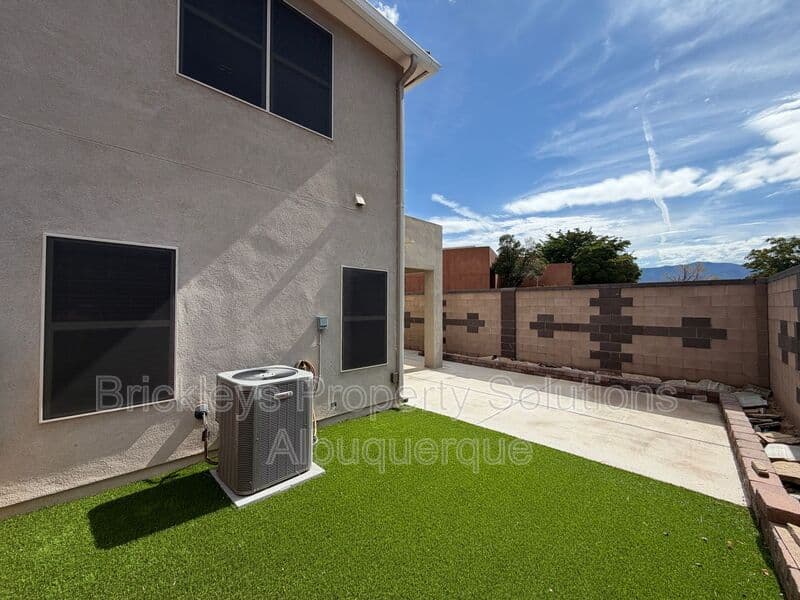 4-bedroom 2.5-bath home at 7420 Tangerine Court NE for $2,450/mo managed by Brickleys Property Solutions Albuquerque — photo 39 of 39