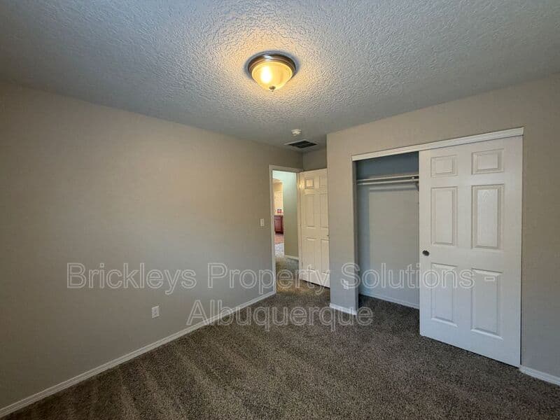 3-bedroom 2-bath home at 8035 Sierra Altos Pl. NW for $2,150/mo managed by Brickleys Property Solutions Albuquerque — photo 22 of 29