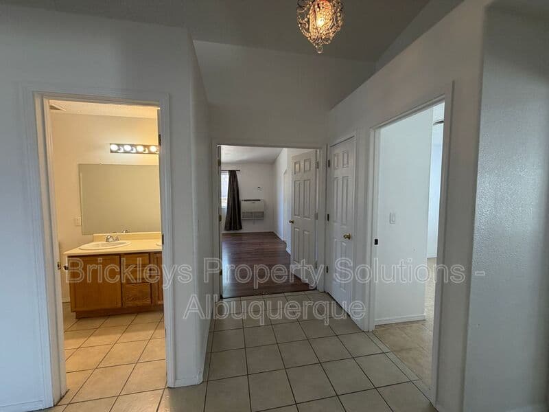 3-bedroom 2-bath home at 1405 Secret Valley Drive SW for $1,800/mo managed by Brickleys Property Solutions Albuquerque — photo 15 of 34
