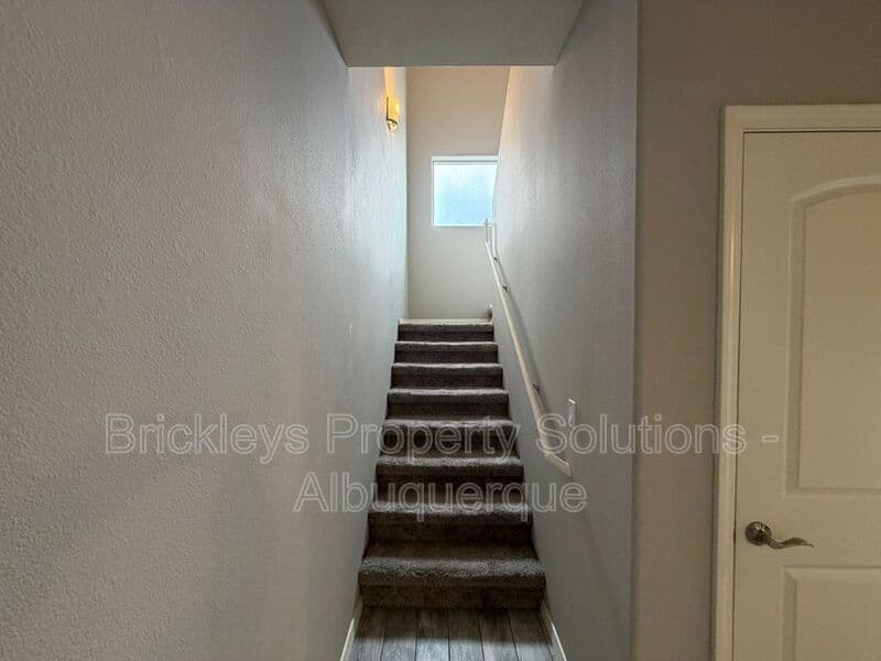 4-bedroom 3-bath home at 860 Fire Wheel Loop for $2,300/mo managed by Brickleys Property Solutions Albuquerque — photo 5 of 40