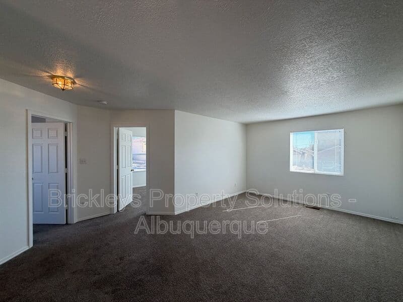 4-bedroom 3-bath home at 6027 Park South Pl NW for $2,400/mo managed by Brickleys Property Solutions Albuquerque — photo 25 of 36