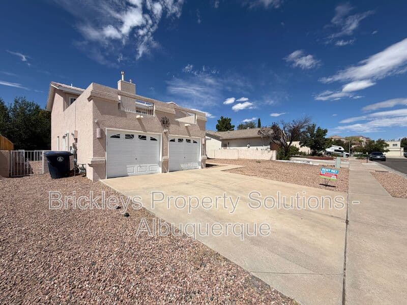4-bedroom 2.5-bath home at 10331 Dunbar St NW for $2,300/mo managed by Brickleys Property Solutions Albuquerque — photo 3 of 43