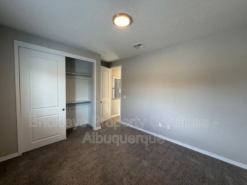 4-bedroom 2-bath home at 3969 Kodiak Rd NE for $2,700/mo managed by Brickleys Property Solutions Albuquerque — photo 7 of 40