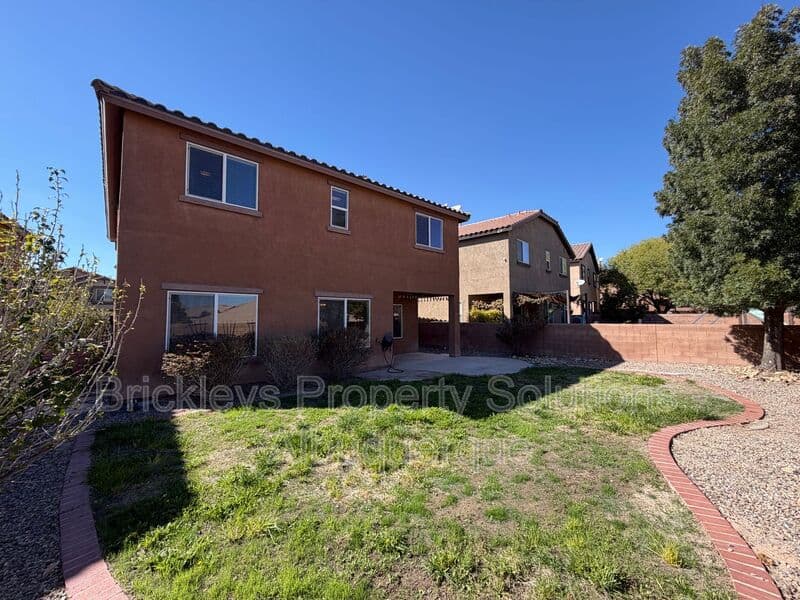 3-bedroom 2.5-bath home at 418 Paseo Roja Pl NE for $2,375/mo managed by Brickleys Property Solutions Albuquerque — photo 41 of 42