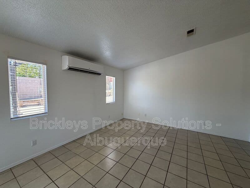 3-bedroom 2-bath home at 1405 Secret Valley Drive SW for $1,800/mo managed by Brickleys Property Solutions Albuquerque — photo 11 of 34