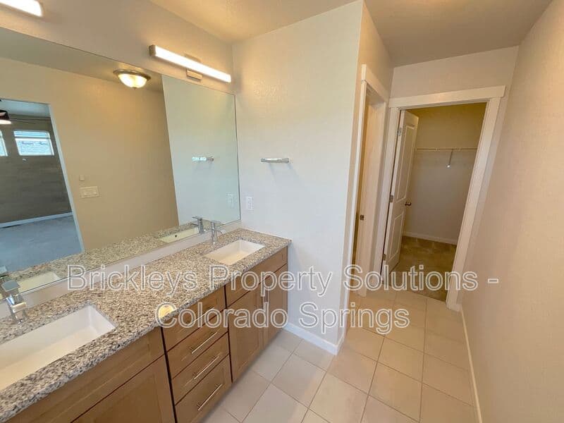 3-bedroom 3.5-bath home at 7343 Rosa Belle Hts for $2,350/mo managed by Brickleys Property Solutions Colorado Springs — photo 26 of 33