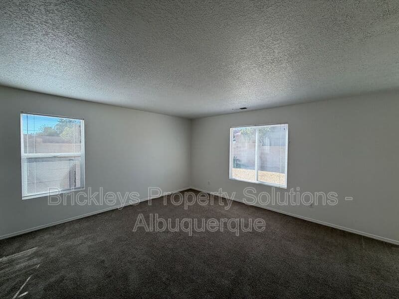 4-bedroom 3-bath home at 6027 Park South Pl NW for $2,400/mo managed by Brickleys Property Solutions Albuquerque — photo 12 of 36