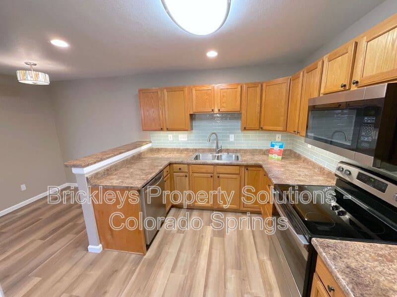 3-bedroom 2.5-bath home at 1742 Victorian Pt for $2,338/mo total (includes $2,300 base rent + $38 required Tenant Benefit Package) managed by Brickleys Property Solutions Colorado Springs — photo 13 of 36