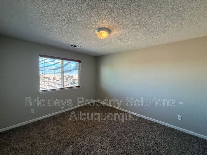 3-bedroom 2.5-bath home at 418 Paseo Roja Pl NE for $2,375/mo managed by Brickleys Property Solutions Albuquerque — photo 14 of 42