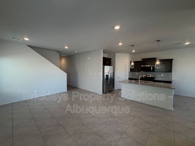 3-bedroom 3-bath home at 6118 Chicago Dr SE for $2,350/mo managed by Brickleys Property Solutions Albuquerque — photo 5 of 42