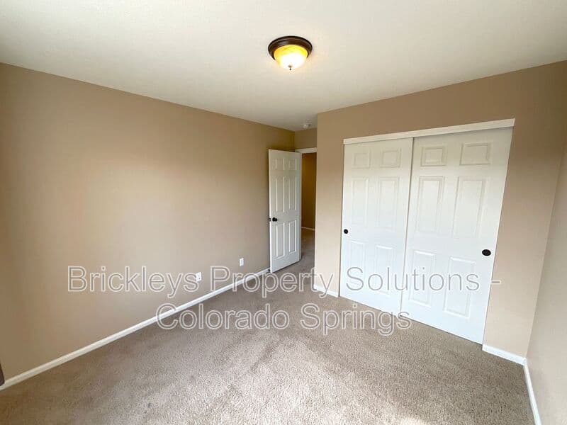 4-bedroom 2.5-bath home at 6652 Maple Stone Ln for $2,600/mo managed by Brickleys Property Solutions Colorado Springs — photo 35 of 43