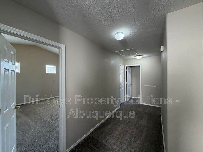 5-bedroom 4.5-bath home at 7008 Tree Line Ave NW for $2,500/mo managed by Brickleys Property Solutions Albuquerque — photo 7 of 43