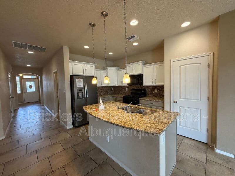 3-bedroom 2-bath home at 7304 Skagway Dr. NE for $2,200/mo managed by Brickleys Property Solutions Albuquerque — photo 16 of 36