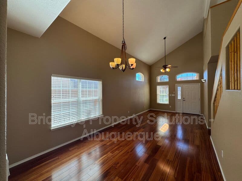 4-bedroom 3-bath home at 7131 Wild Olive Ave NE for $2,900/mo managed by Brickleys Property Solutions Albuquerque — photo 7 of 38