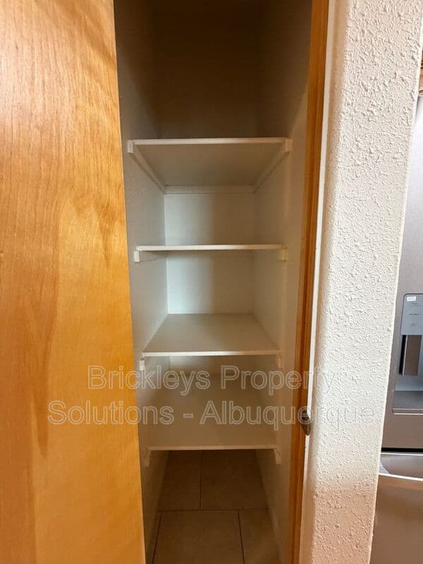 3-bedroom 2.5-bath home at 1612 3rd St SW for $1,900/mo managed by Brickleys Property Solutions Albuquerque — photo 9 of 39