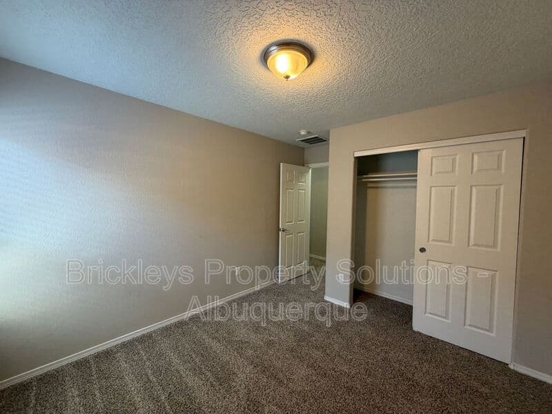 3-bedroom 2-bath home at 8035 Sierra Altos Pl. NW for $2,150/mo managed by Brickleys Property Solutions Albuquerque — photo 24 of 29