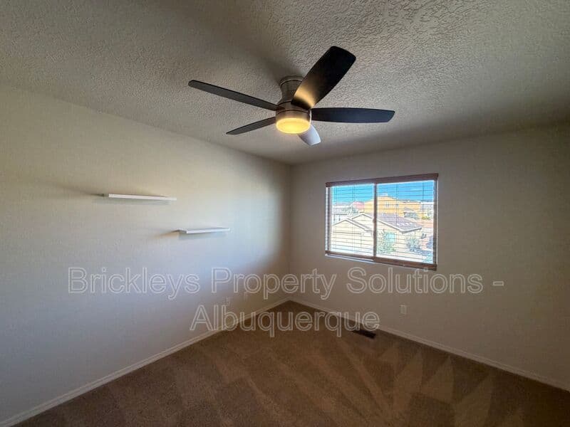 4-bedroom 3.5-bath home at 6228 Nacional Rd NW for $2,700/mo managed by Brickleys Property Solutions Albuquerque — photo 19 of 44