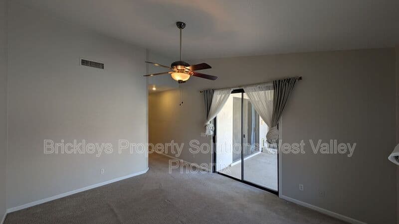 4-bedroom 3-bath home at 13354 W Palm Ln for $2,750/mo managed by Brickleys Property Solutions West Valley Phoenix — photo 7 of 31