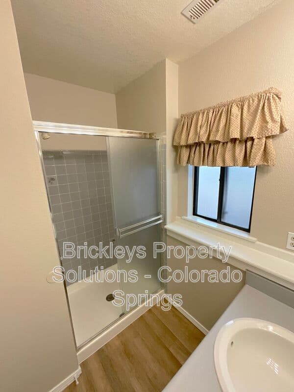 3-bedroom 2-bath home at 8214 Steadman Dr for $2,175/mo managed by Brickleys Property Solutions Colorado Springs — photo 27 of 34