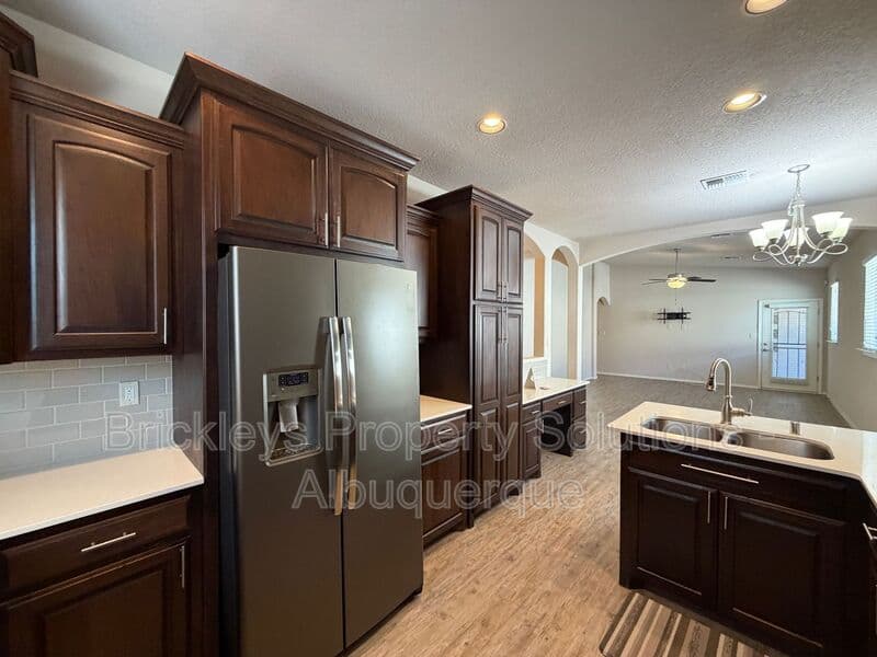 3-bedroom 2-bath home at 5815 Mafraq Ave NW for $2,150/mo managed by Brickleys Property Solutions Albuquerque — photo 7 of 32