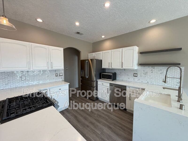 3-bedroom 2-bath home at 6812 Nagoya Rd NE for $2,700/mo managed by Brickleys Property Solutions Albuquerque — photo 21 of 43