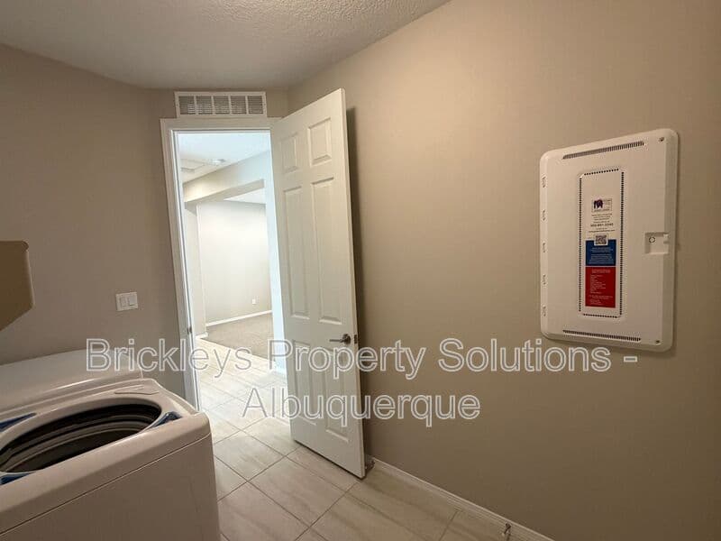 3-bedroom 2-bath home at 938 Lazuli Rd SE for $2,475/mo managed by Brickleys Property Solutions Albuquerque — photo 34 of 36