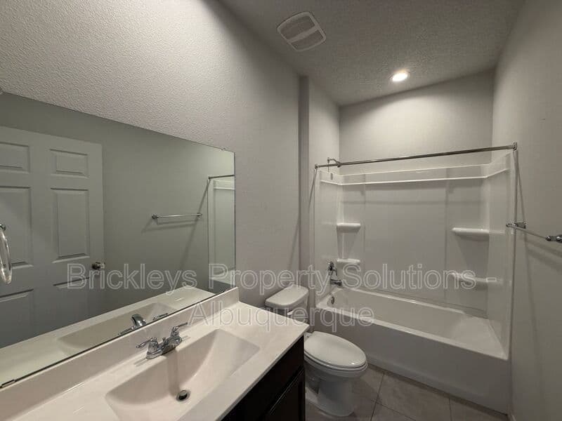 3-bedroom 2-bath home at 1504 Alto Colores for $2,100/mo managed by Brickleys Property Solutions Albuquerque — photo 19 of 30