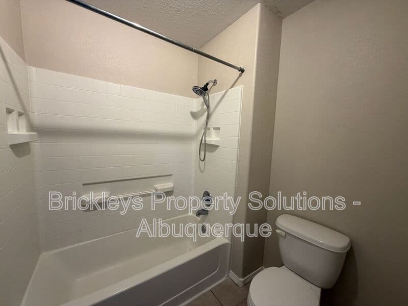 5-bedroom 4.5-bath home at 7008 Tree Line Ave NW for $2,500/mo managed by Brickleys Property Solutions Albuquerque — photo 22 of 43
