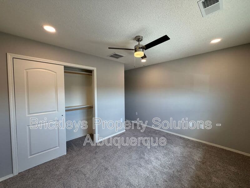 4-bedroom 3-bath home at 860 Fire Wheel Loop for $2,300/mo managed by Brickleys Property Solutions Albuquerque — photo 12 of 40