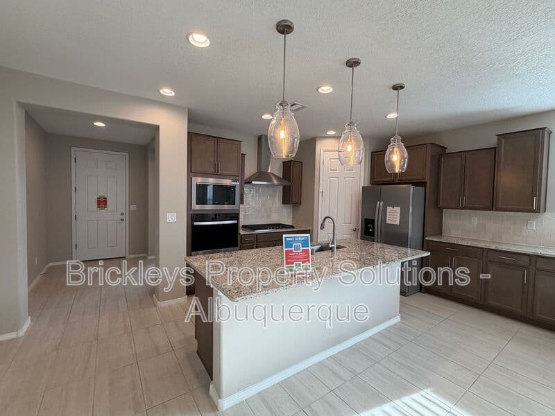 3-bedroom 2-bath home at 938 Lazuli Rd SE for $2,475/mo managed by Brickleys Property Solutions Albuquerque — photo 11 of 36
