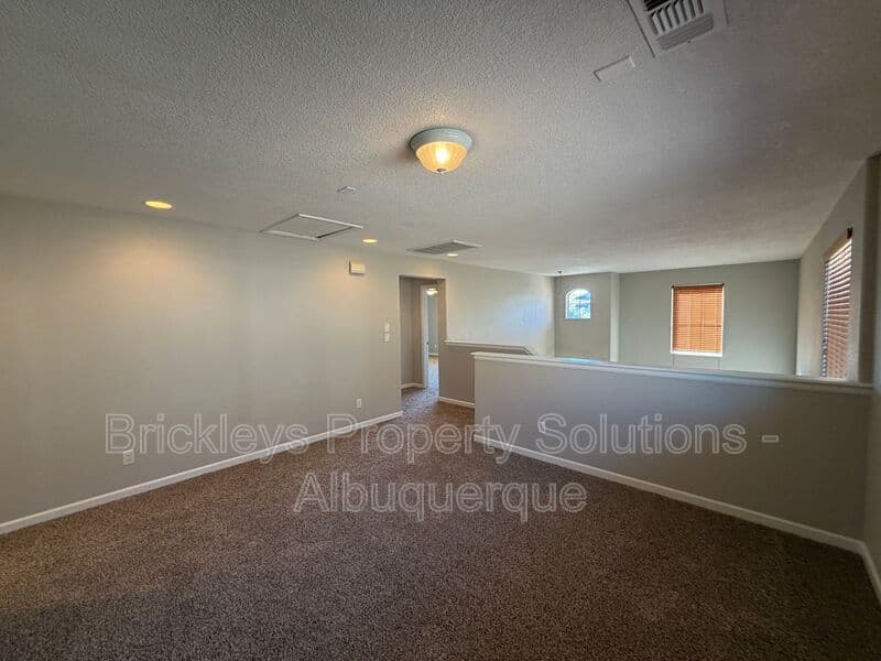 3-bedroom 2.5-bath home at 418 Paseo Roja Pl NE for $2,375/mo managed by Brickleys Property Solutions Albuquerque — photo 8 of 42