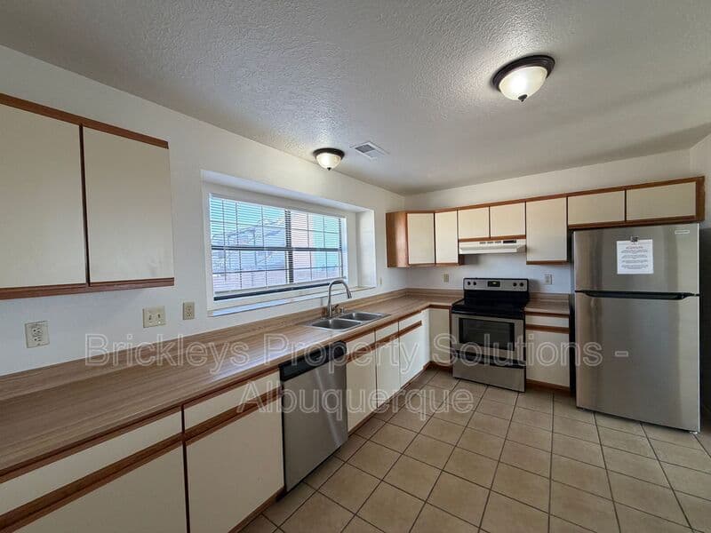 3-bedroom 2-bath home at 4520 Rockaway Loop NE for $1,900/mo managed by Brickleys Property Solutions Albuquerque — photo 6 of 29