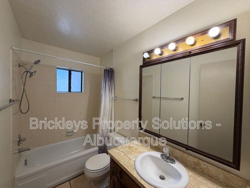 3-bedroom 2-bath home at 9937 Clearwater St. NW for $1,900/mo managed by Brickleys Property Solutions Albuquerque — photo 15 of 27