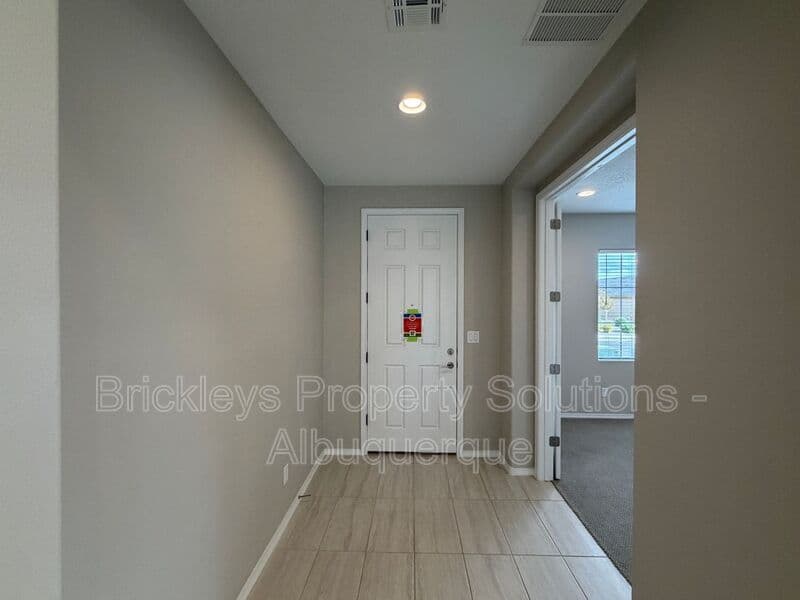 3-bedroom 2-bath home at 938 Lazuli Rd SE for $2,475/mo managed by Brickleys Property Solutions Albuquerque — photo 8 of 36