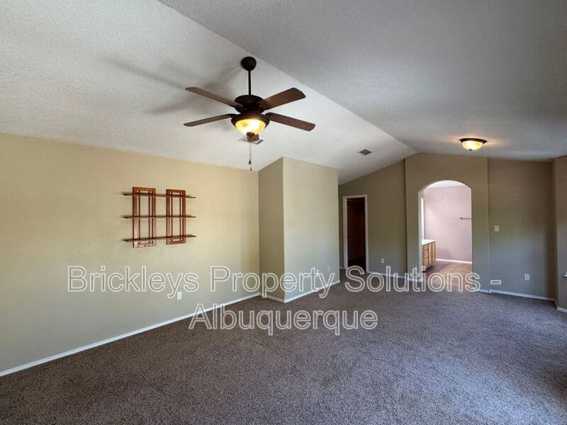 4-bedroom 3-bath home at 7131 Wild Olive Ave NE for $2,900/mo managed by Brickleys Property Solutions Albuquerque — photo 28 of 38