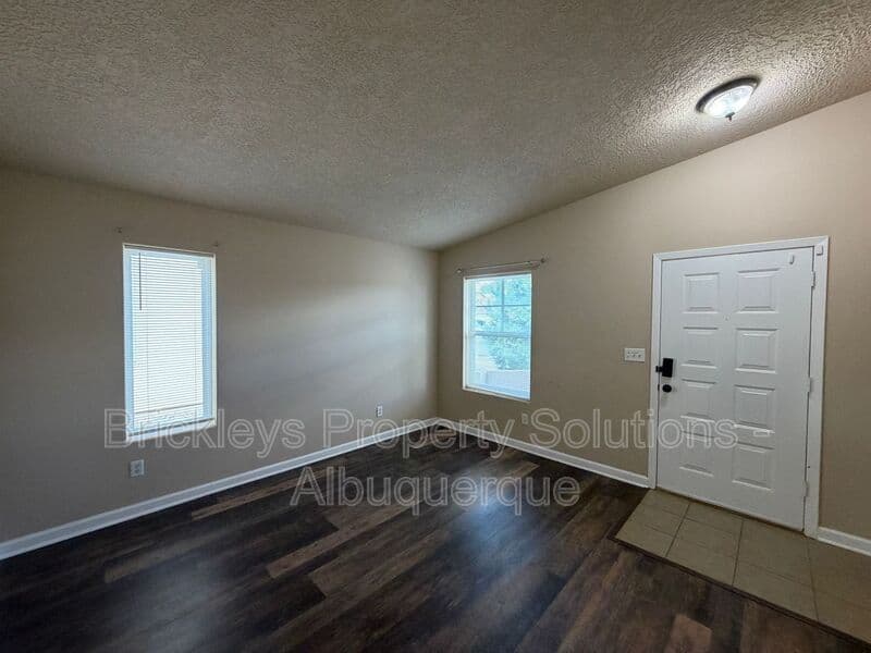 3-bedroom 2-bath home at 1548 Reynosa Loop SE for $1,900/mo managed by Brickleys Property Solutions Albuquerque — photo 4 of 31